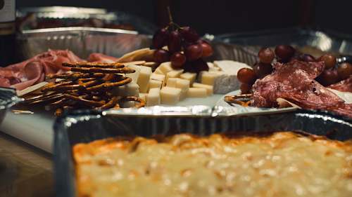 sea life pretzels beside cheese on plate lobster
